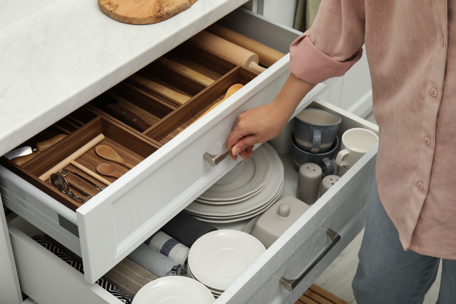 Organized kitchen drawer with utensils